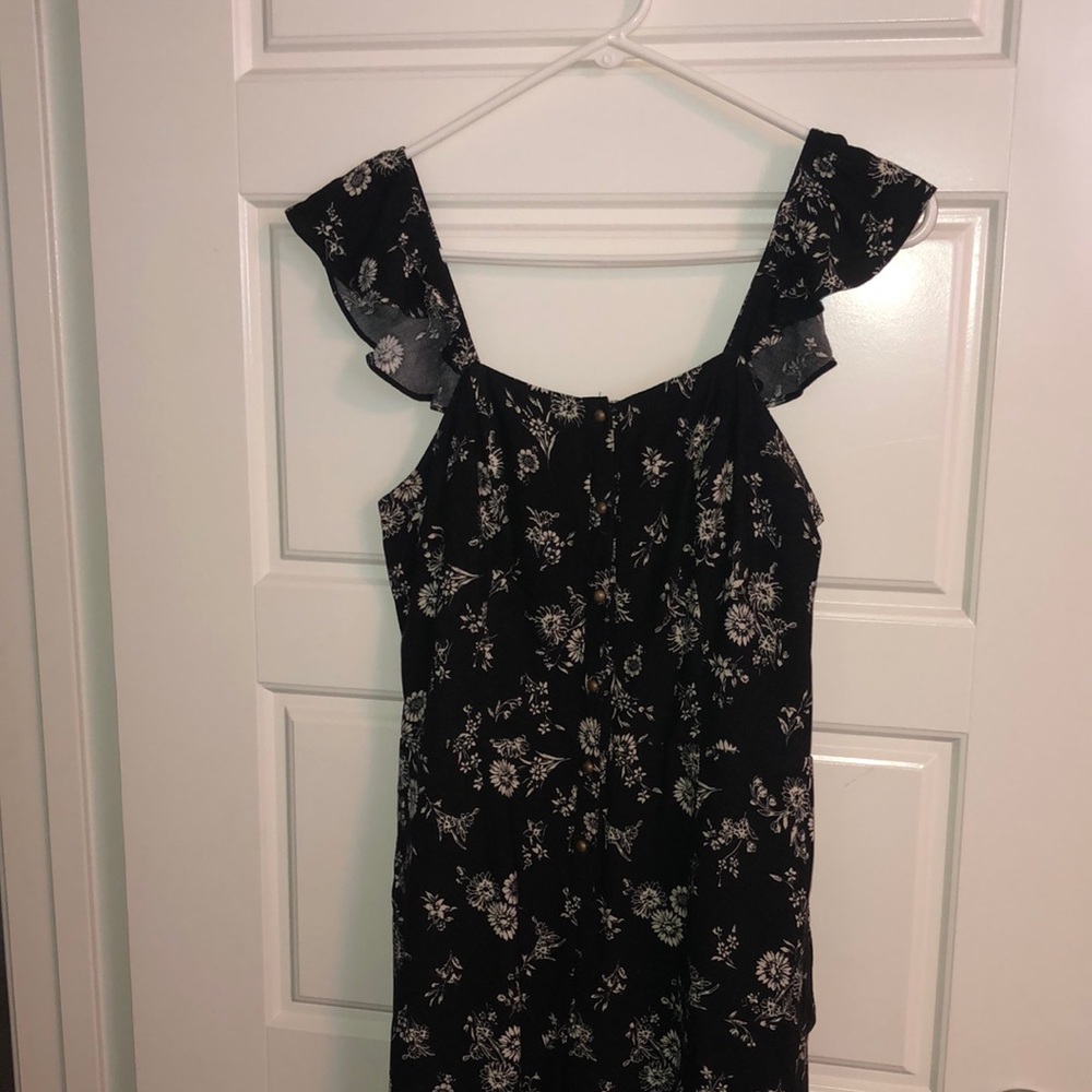 Black and floral ruffel sleeve jumpsuit